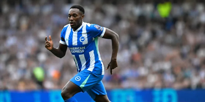 Danny Welbeck playing for Brighton & Hove Albion during a Premier League match amid reported transfer interest from Chelsea.