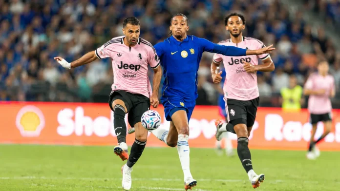 Chelsea player races with two Juventus defenders during the Chelsea vs Juventus pre-season friendly in a 1-0 Juventus victory ahead of the 2026-27 season.